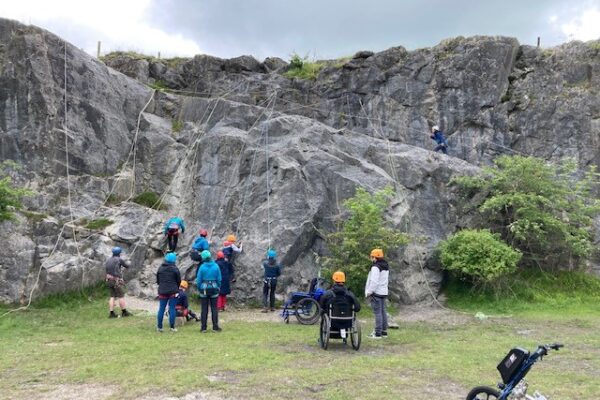 A group from Bendrigg rock climbing in a quarry